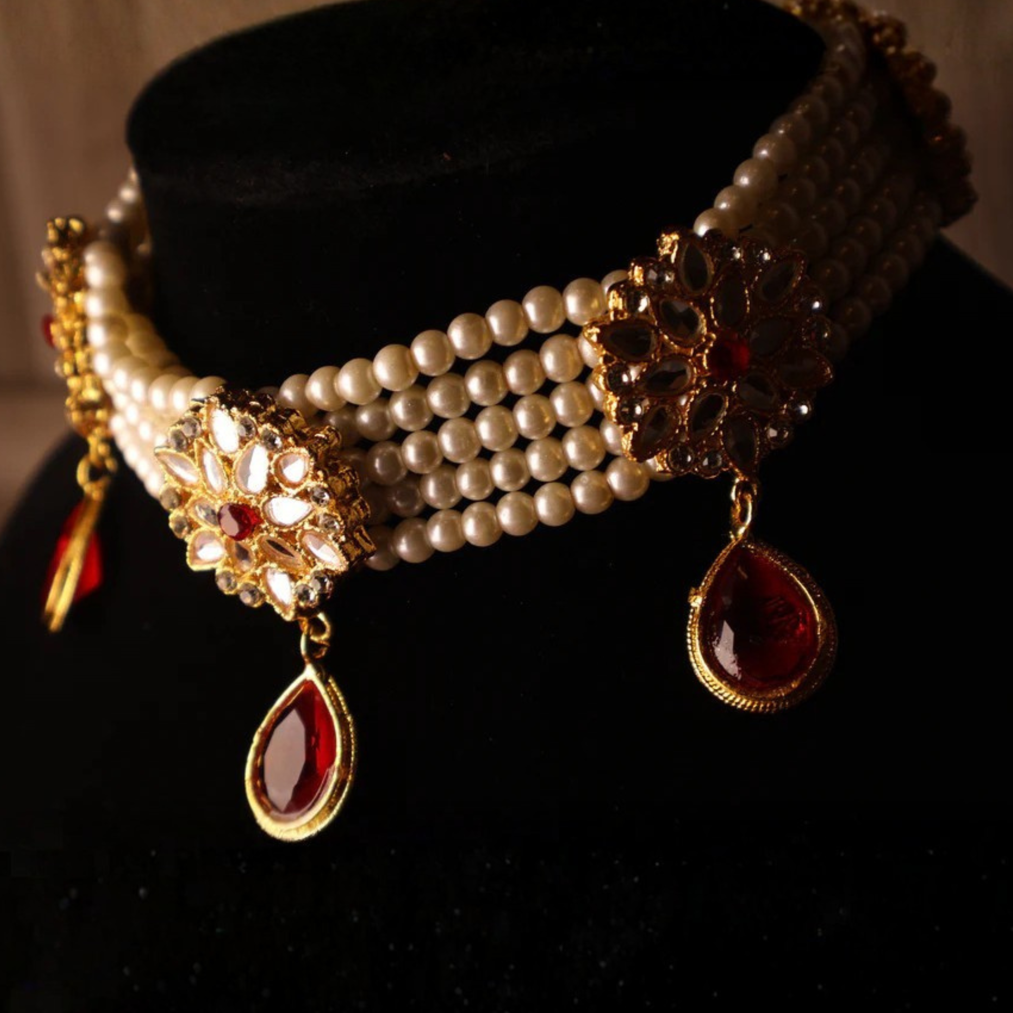 YAQOOT ruby red pearl and gold kundan-style choker set with tikka and earrings