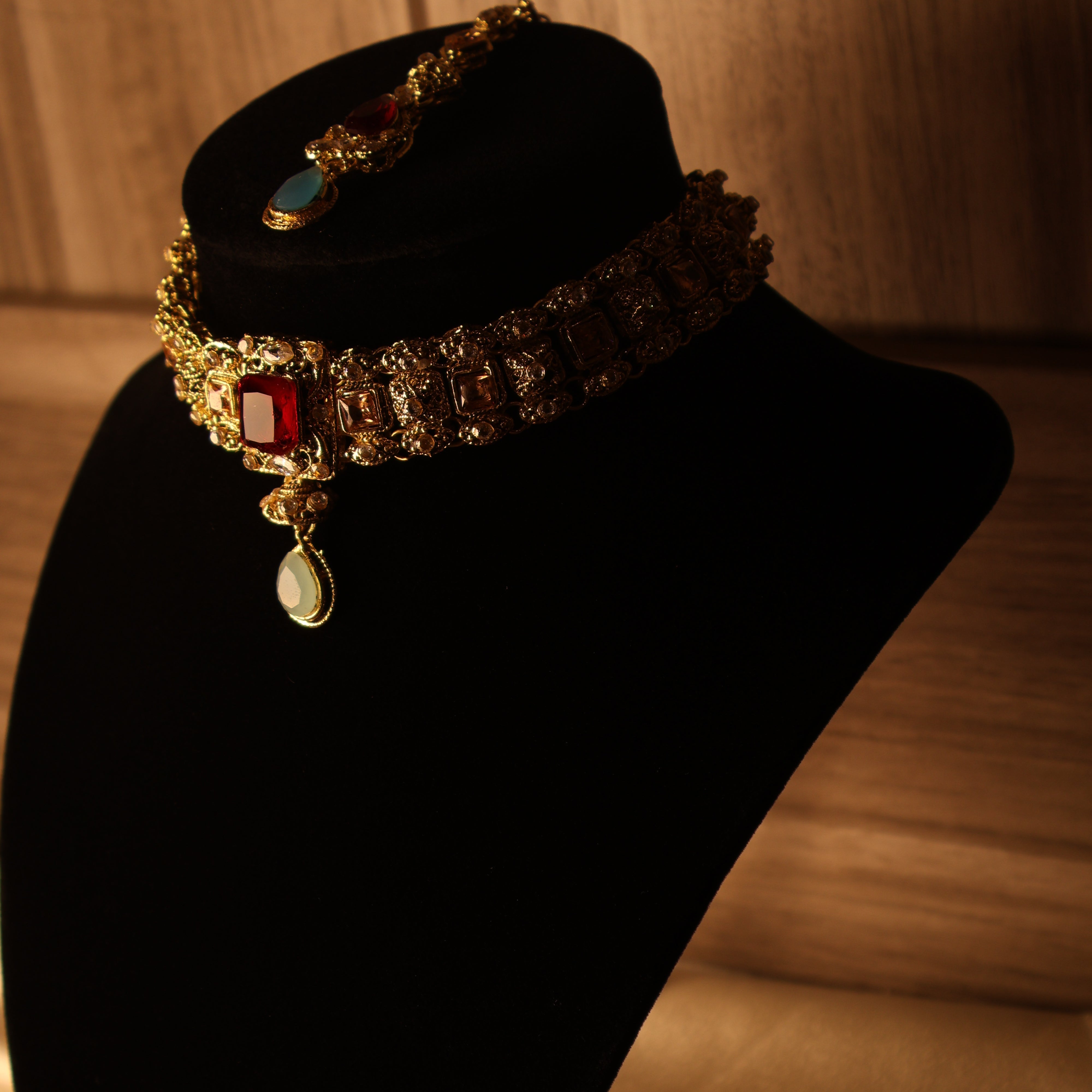 SITARA red, blue and gold kundan-style choker set with tikka and earrings