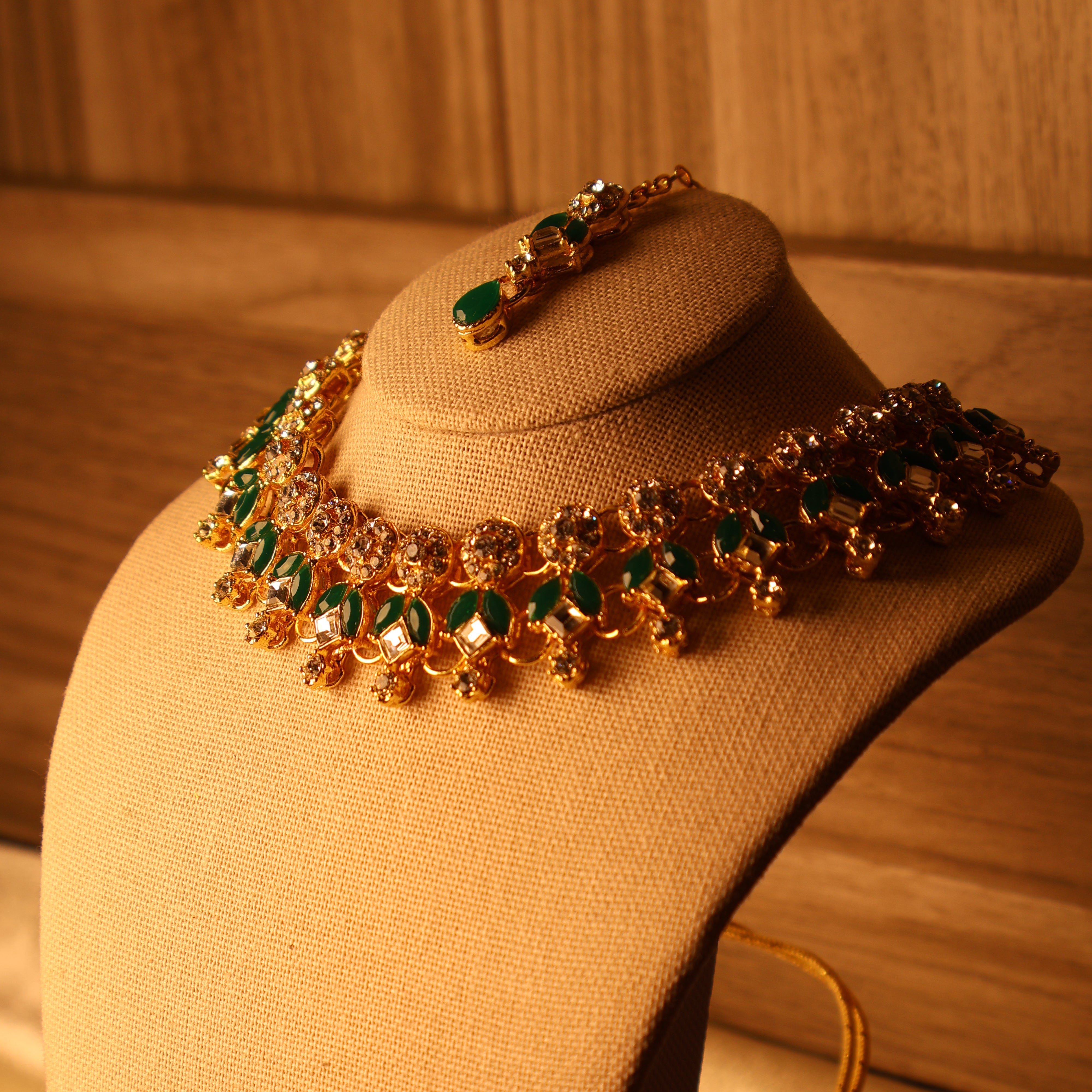 ZAMURRAD emerald green and gold kundan-style necklace set with tikka and earrings