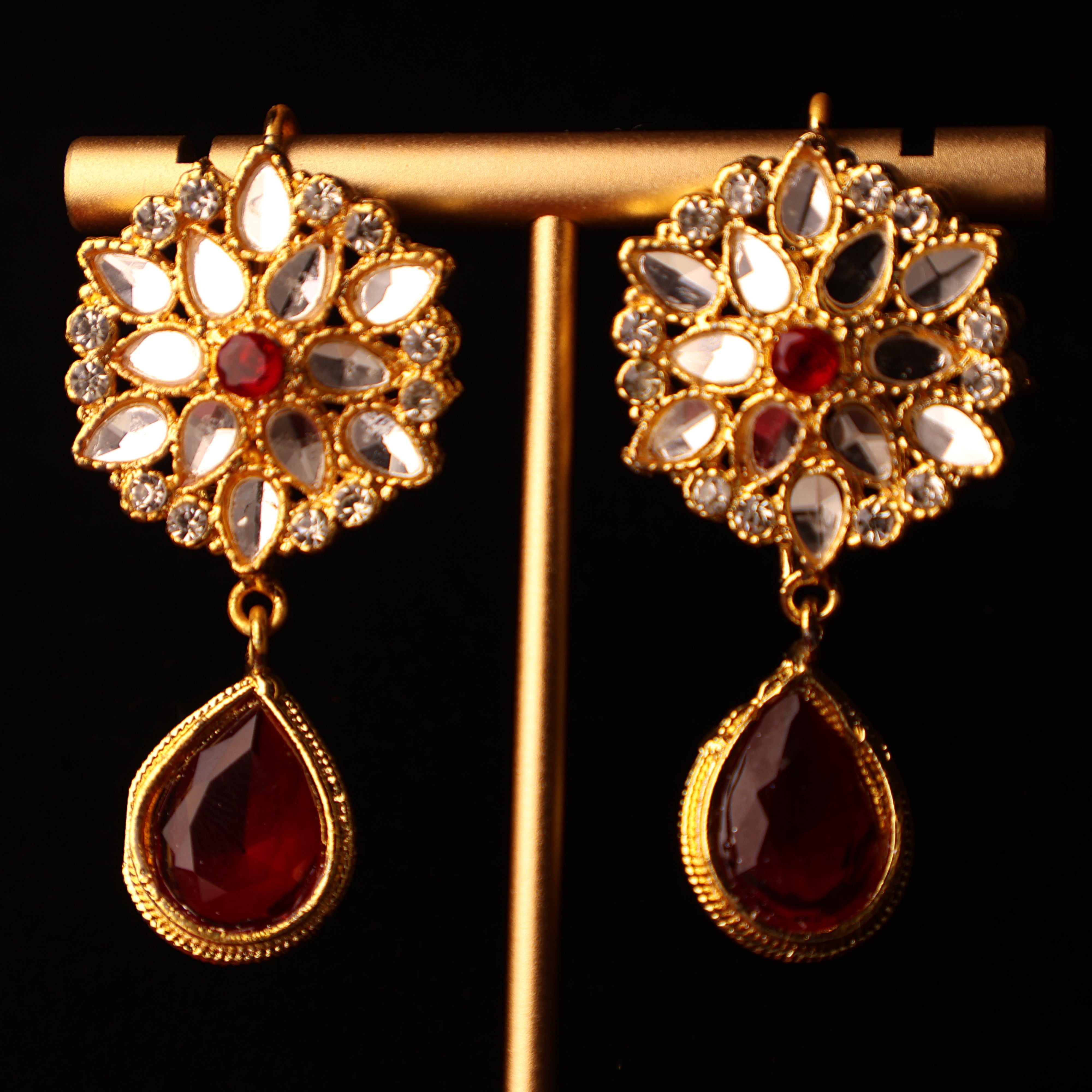 YAQOOT ruby red pearl and gold kundan-style choker set with tikka and earrings