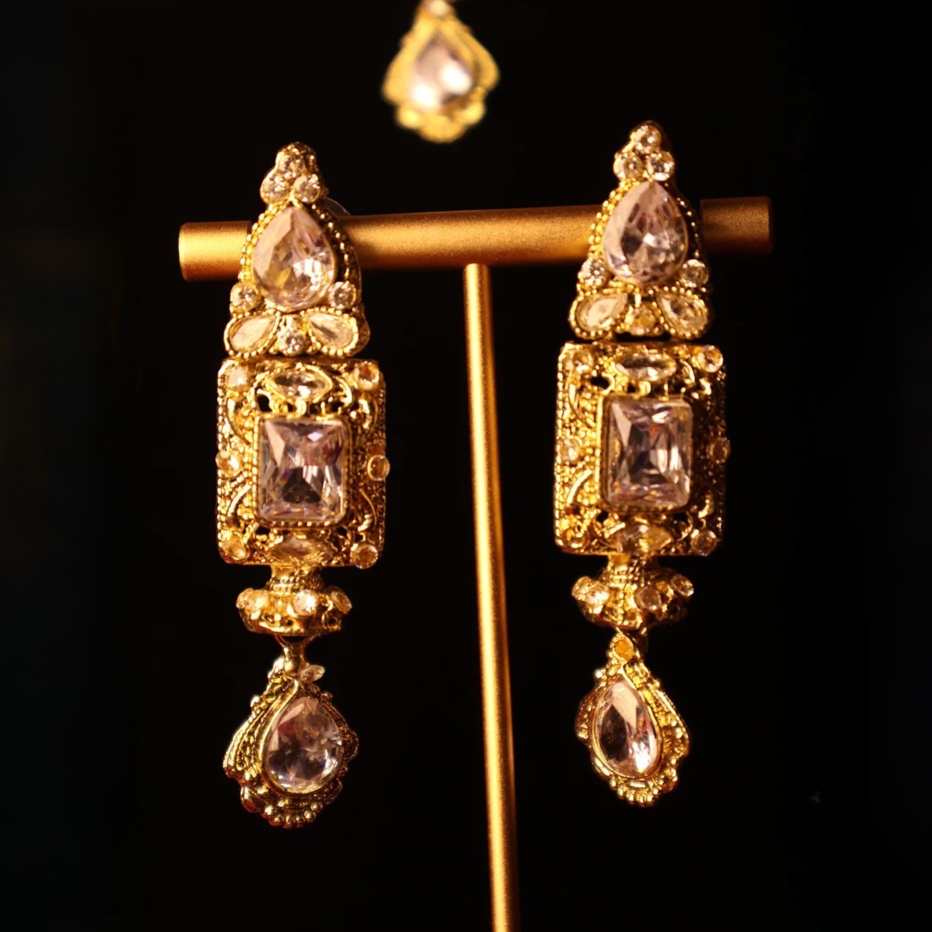 NAAZ light pink and gold kundan-style choker set with tikka and earrings