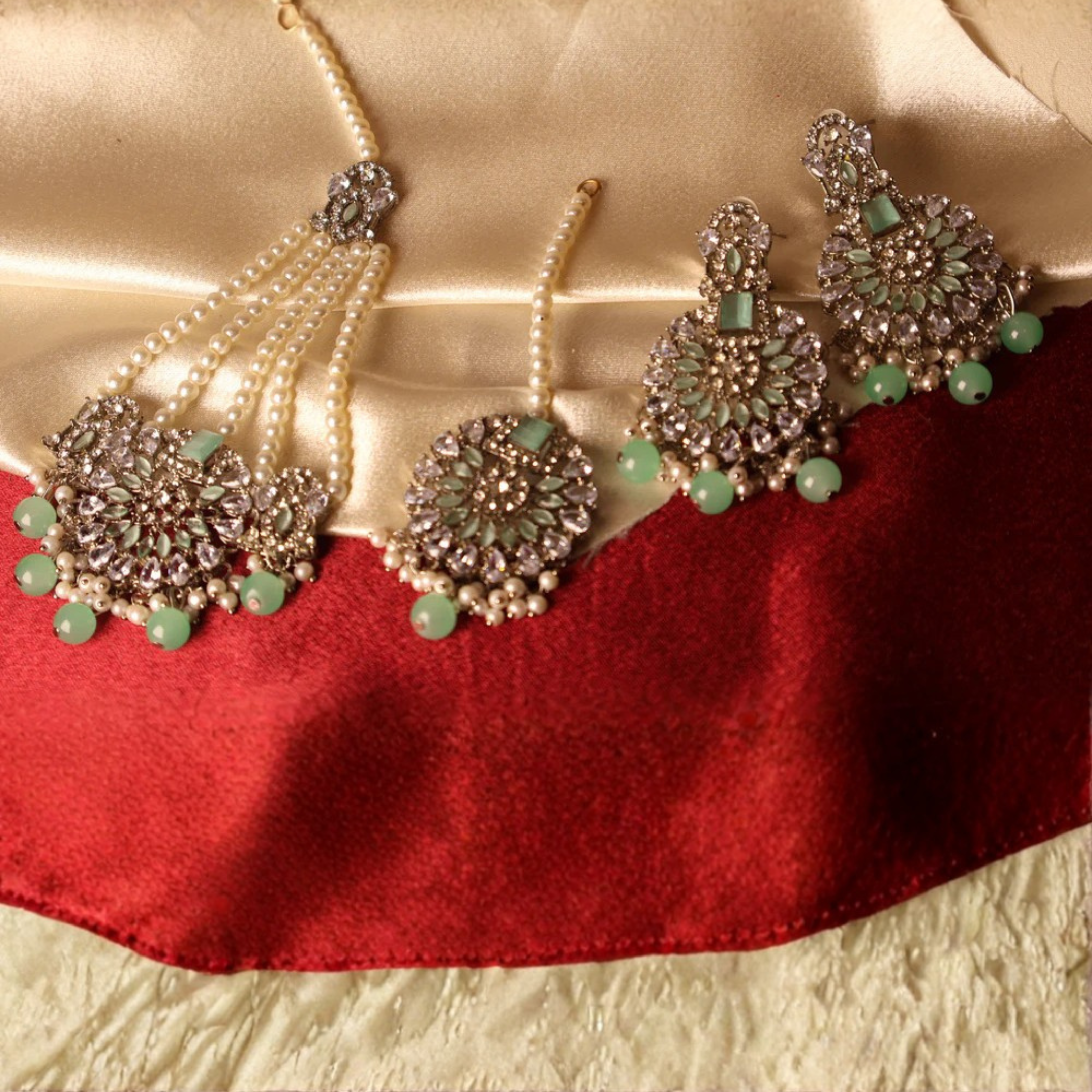 CHANDNI silver-tone mint green kundan-style bridal set with chandbali earrings and tikka