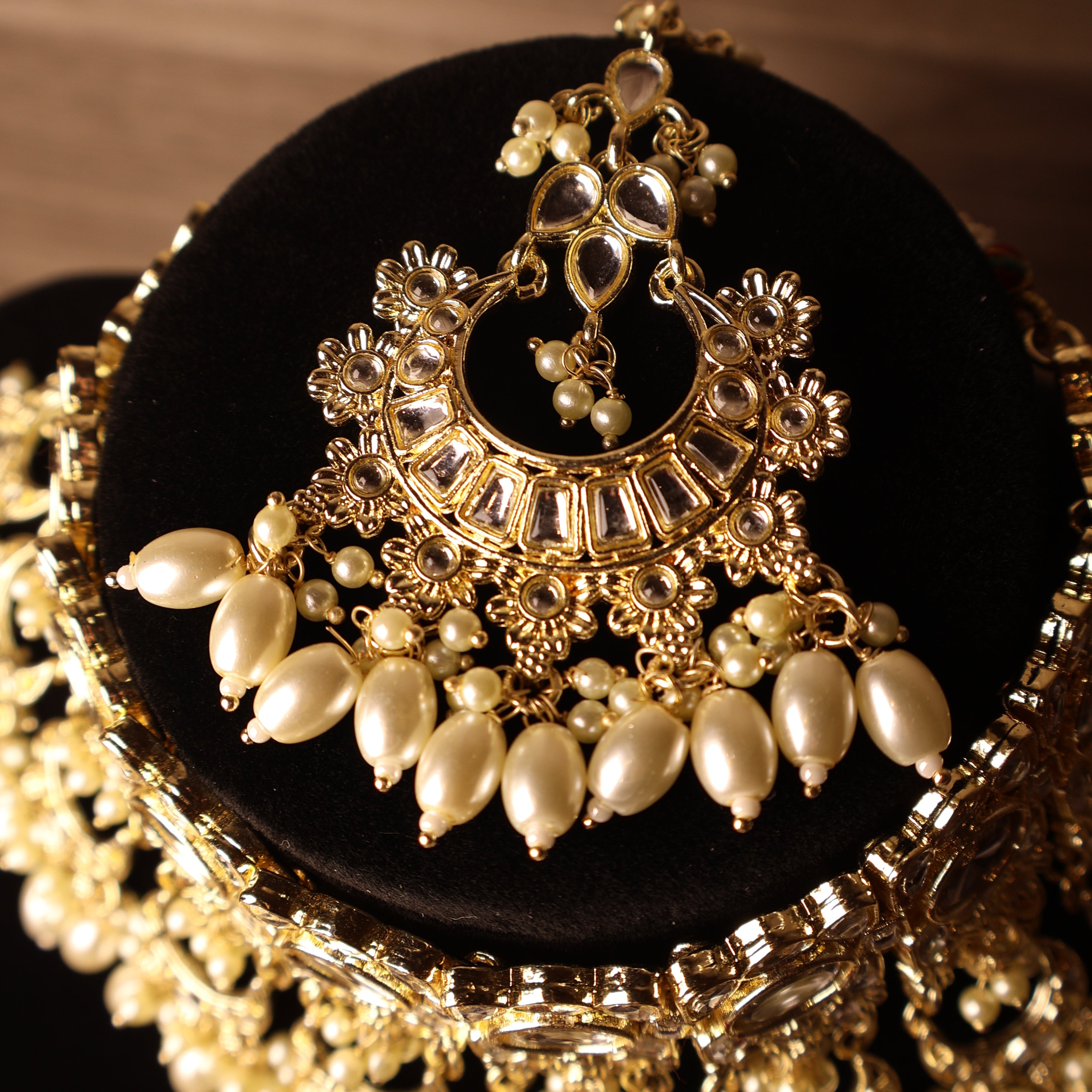 ROSHANARA gold and pearl kundan-style bridal collar with jhumka earrings and tikka