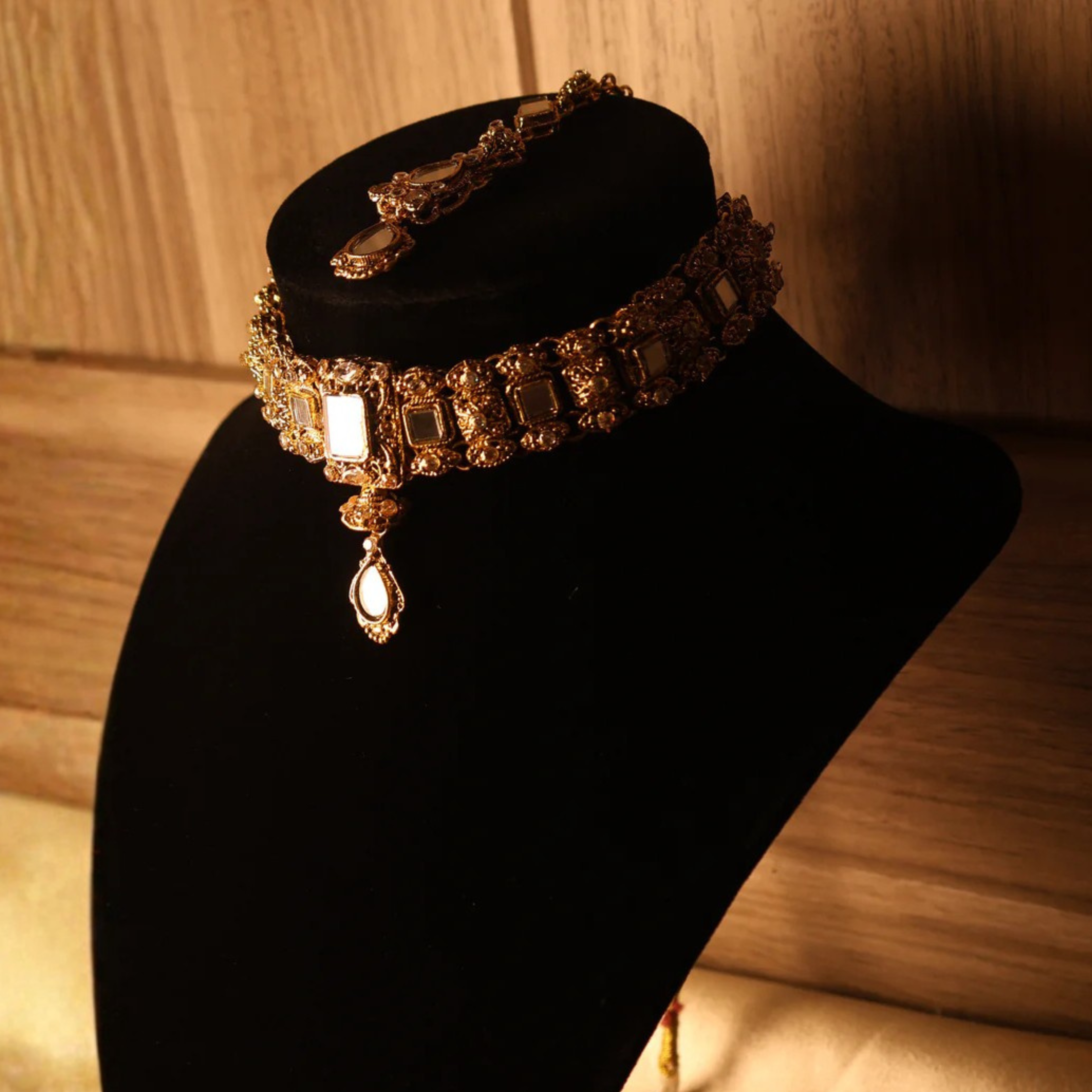 AAINA mirror-cut gold kundan-style choker set with tikka and earrings